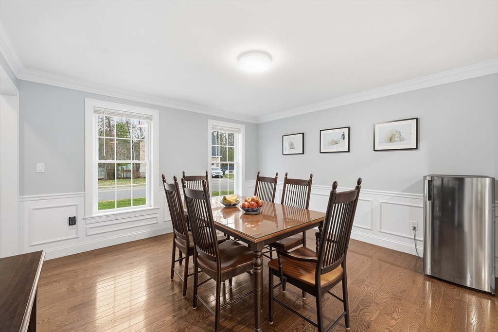 44 Bacon Street Pepperell, MA 01463 - Photo 12 of 42 a view of a dining room with furniture and wooden floor