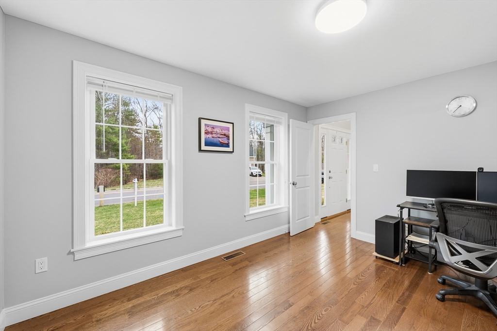 44 Bacon Street Pepperell, MA 01463 - Photo 16 of 42 a view of a workspace with furniture and a window