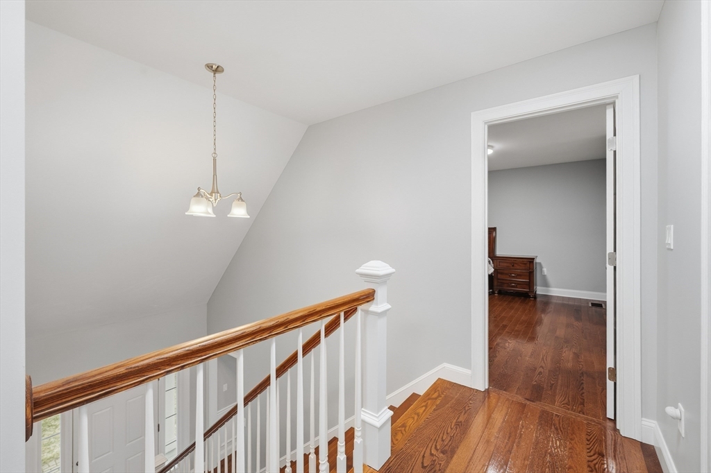 44 Bacon Street Pepperell, MA 01463 - Photo 19 of 42 a view of a room with wooden floor