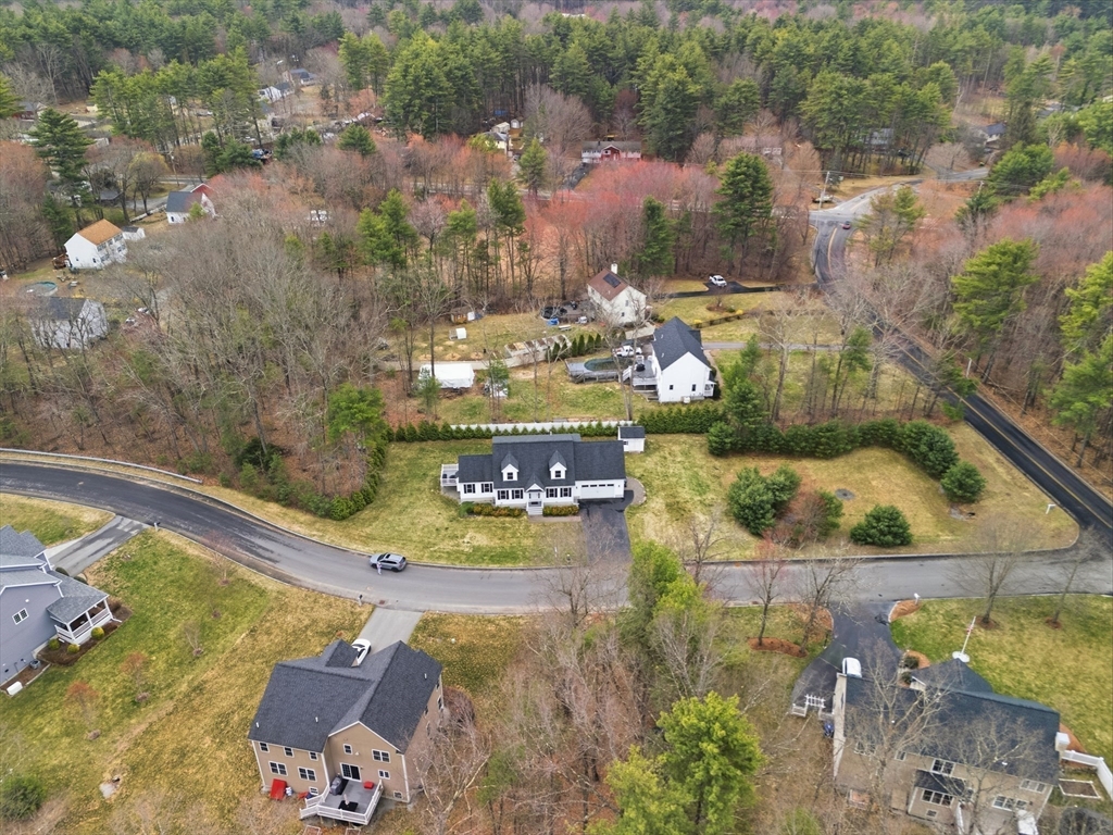 44 Bacon Street Pepperell, MA 01463 - Photo 38 of 42 a view of a swimming pool with a patio