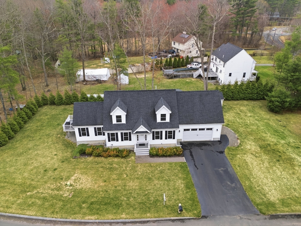 44 Bacon Street Pepperell, MA 01463 - Photo 6 of 42 an aerial view of a house with swimming pool outdoor seating and yard