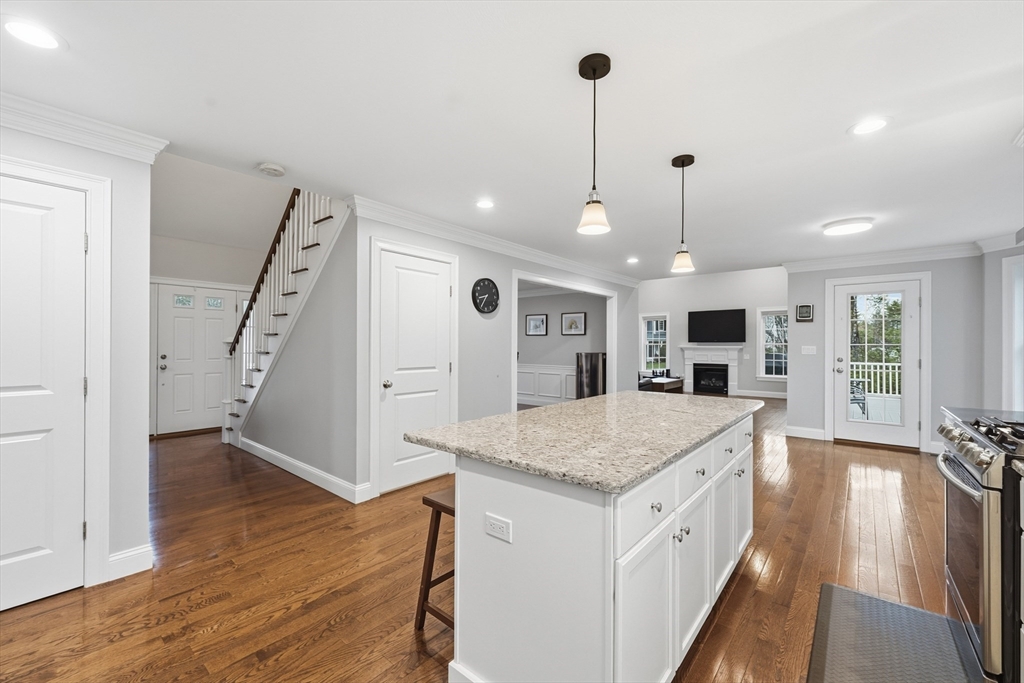 44 Bacon Street Pepperell, MA 01463 - Photo 9 of 42 a very nice looking dining room with a kitchen island