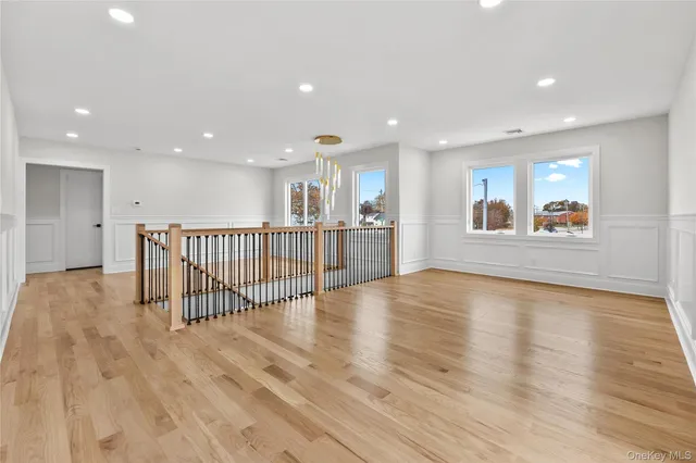 a view of a kitchen with a sink and an oven