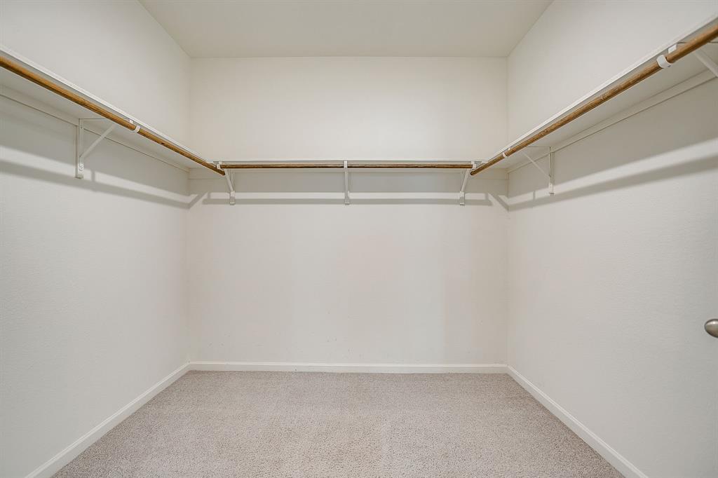 1405 Gentle Crk Lane Fort Worth, TX 76052 - Photo 33 of 40 a view of an empty walk in closet