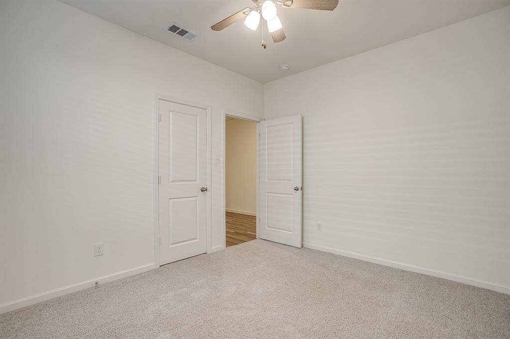 1405 Gentle Crk Lane Fort Worth, TX 76052 - Photo 36 of 40 wooden floor in an empty room