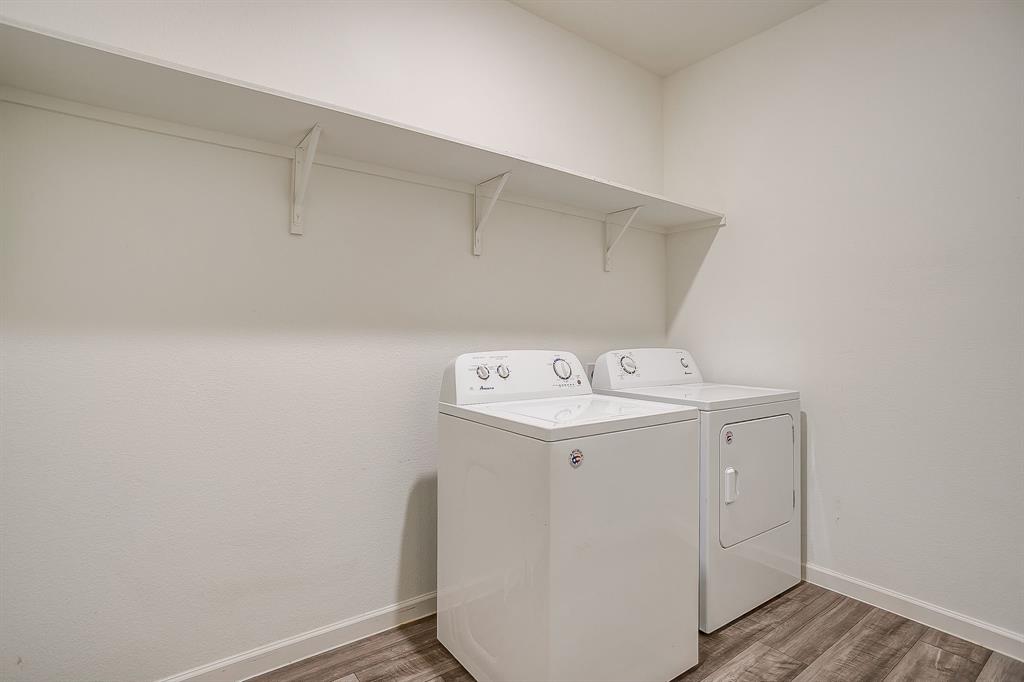 1405 Gentle Crk Lane Fort Worth, TX 76052 - Photo 37 of 40 a utility room with dryer and washer