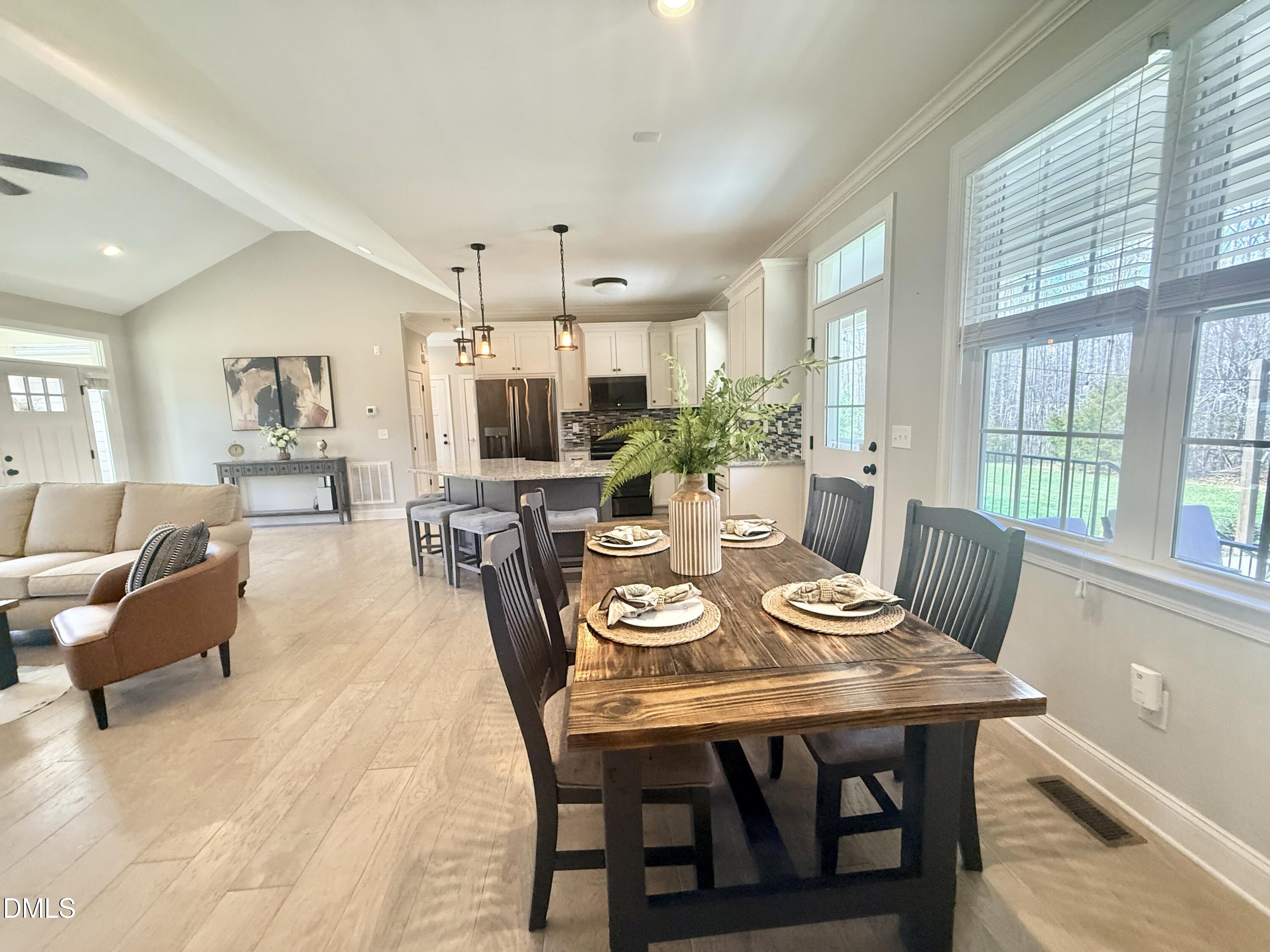 128 Bessie Lane Roxboro, NC 27574 - Photo 12 of 55 a view of a dining room with furniture window and outside view