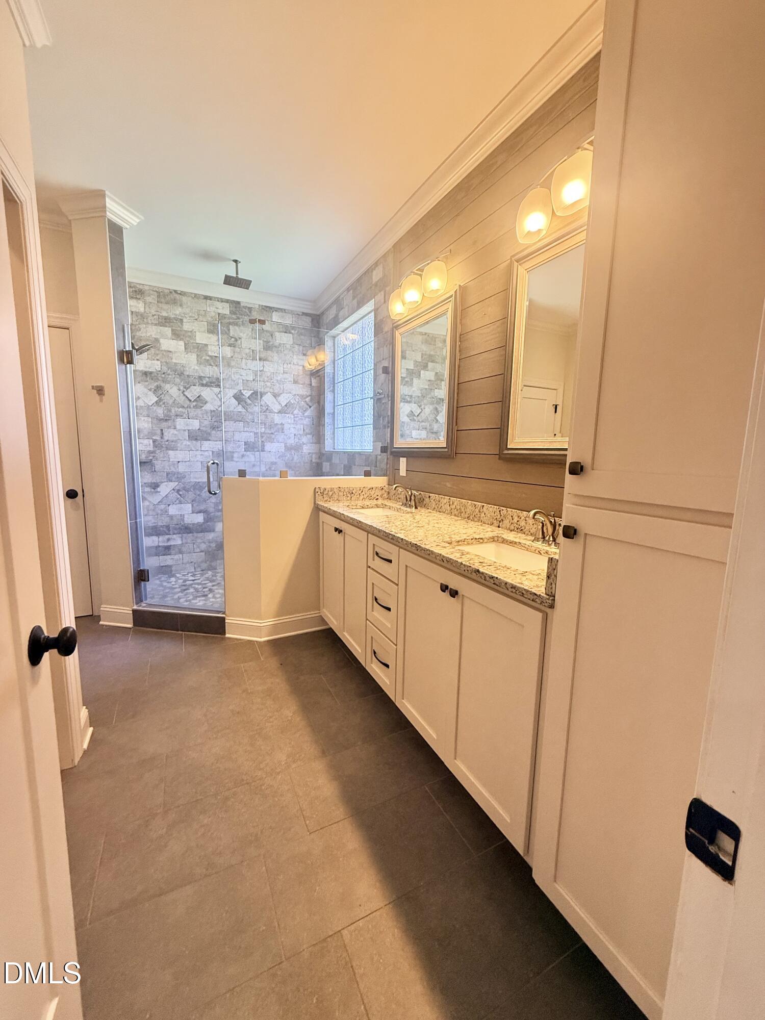 128 Bessie Lane Roxboro, NC 27574 - Photo 24 of 55 a bathroom with a granite countertop sink a toilet and a shower
