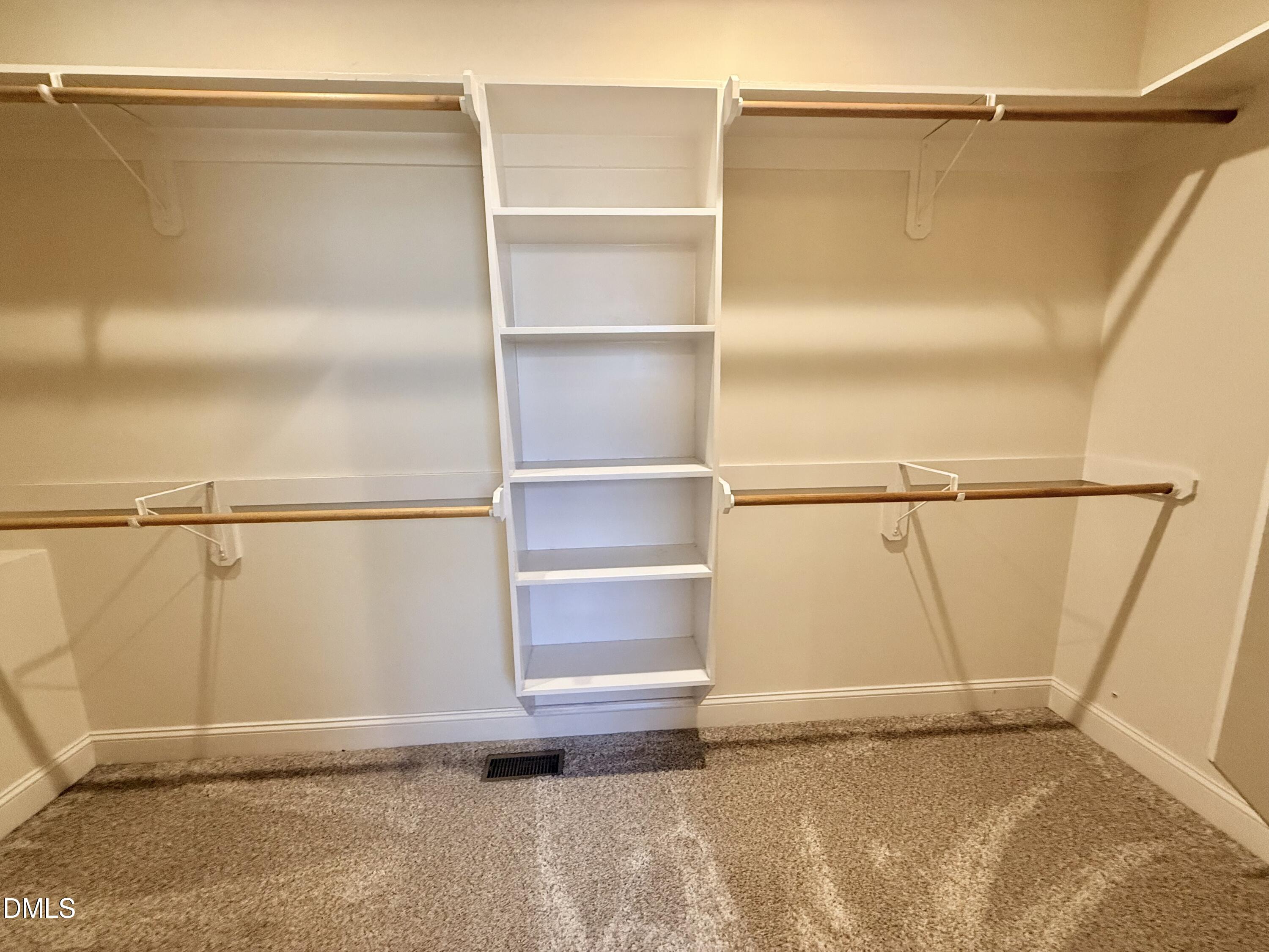 128 Bessie Lane Roxboro, NC 27574 - Photo 31 of 55 a view of walk in closet with empty racks