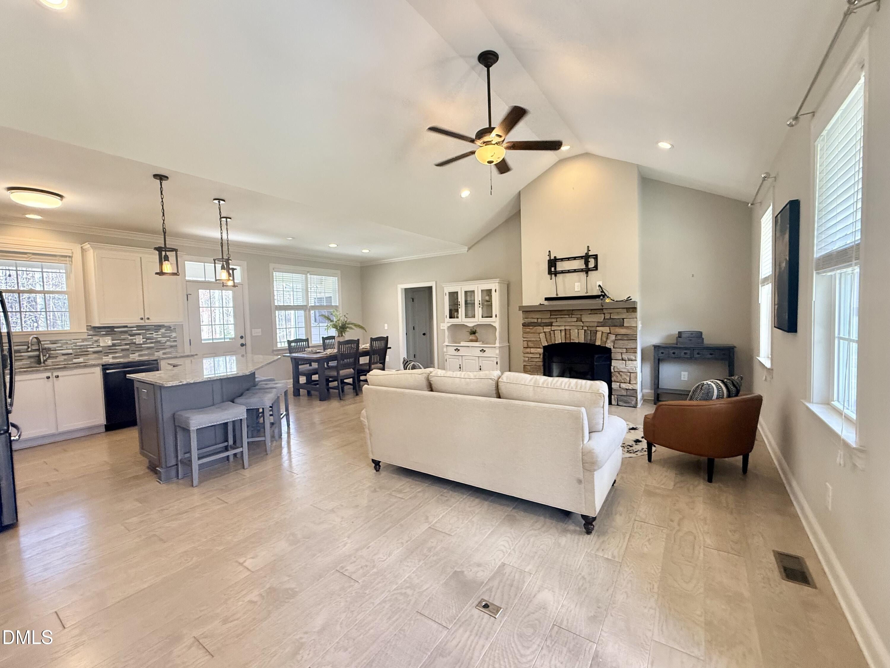 128 Bessie Lane Roxboro, NC 27574 - Photo 6 of 55 a living room with furniture and fireplace