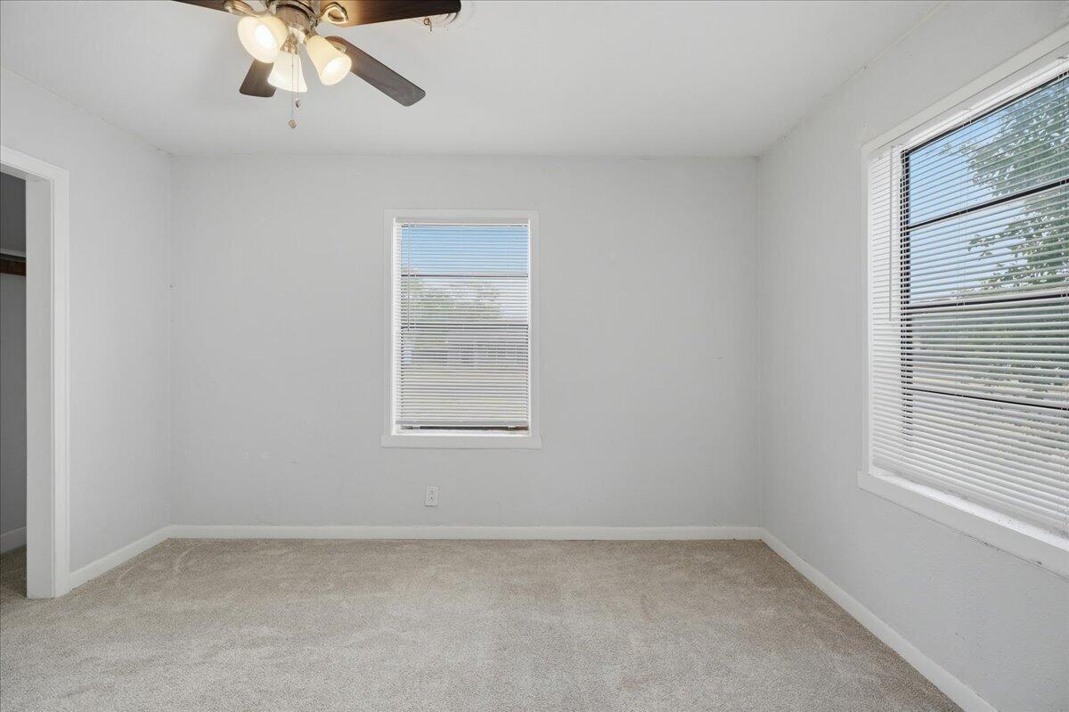 2503 30th Street Lubbock, TX 79410 - Photo 20 of 26 an empty room with a window