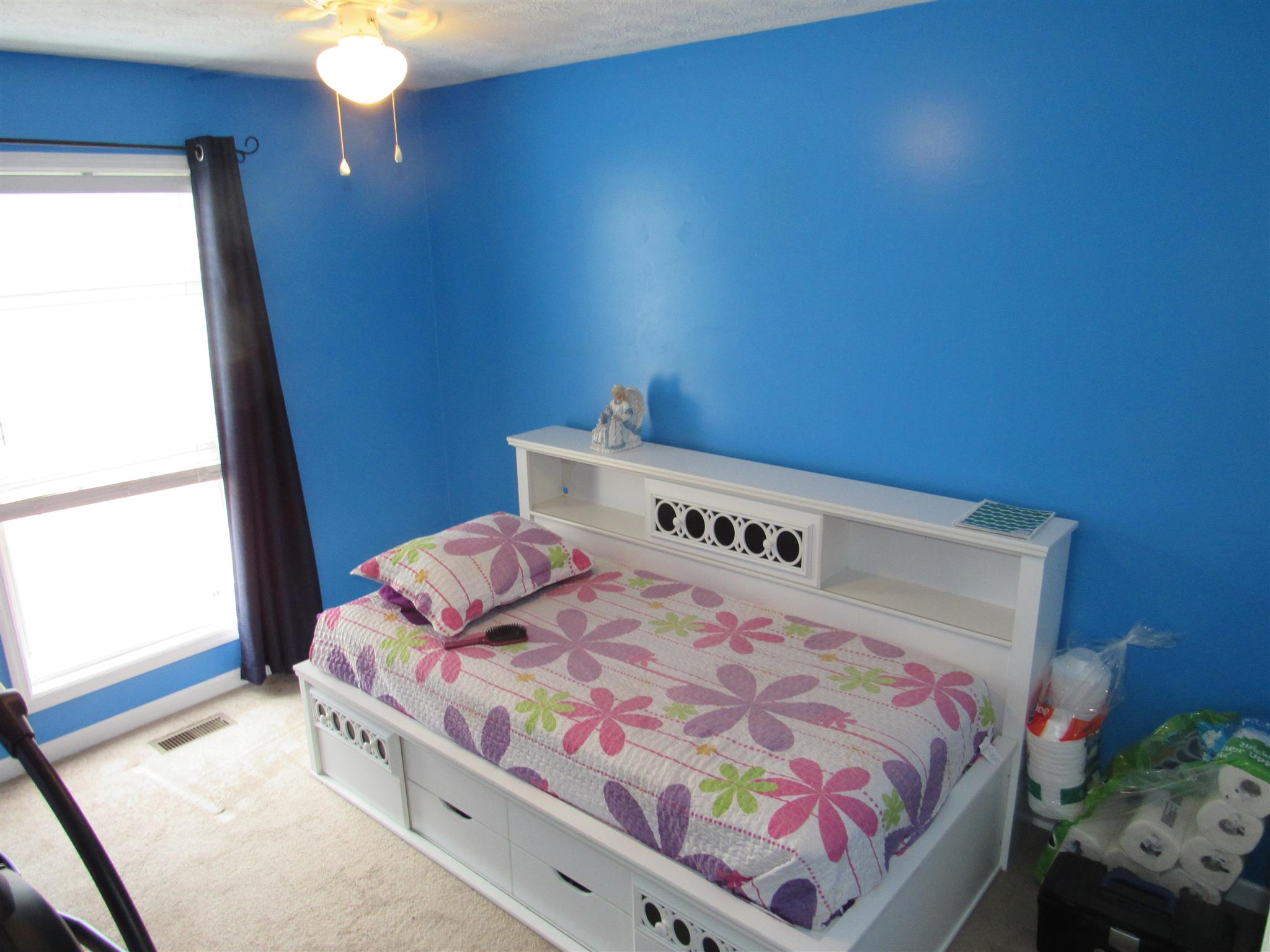180 Benson Road Manchester, TN 37355 - Photo 14 of 15 a bedroom with a bed and a window