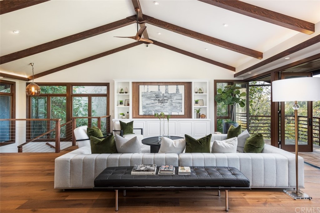 247 Emerald Bay Laguna Beach, CA 92651 - Photo 1 of 47 a living room with furniture and a large window