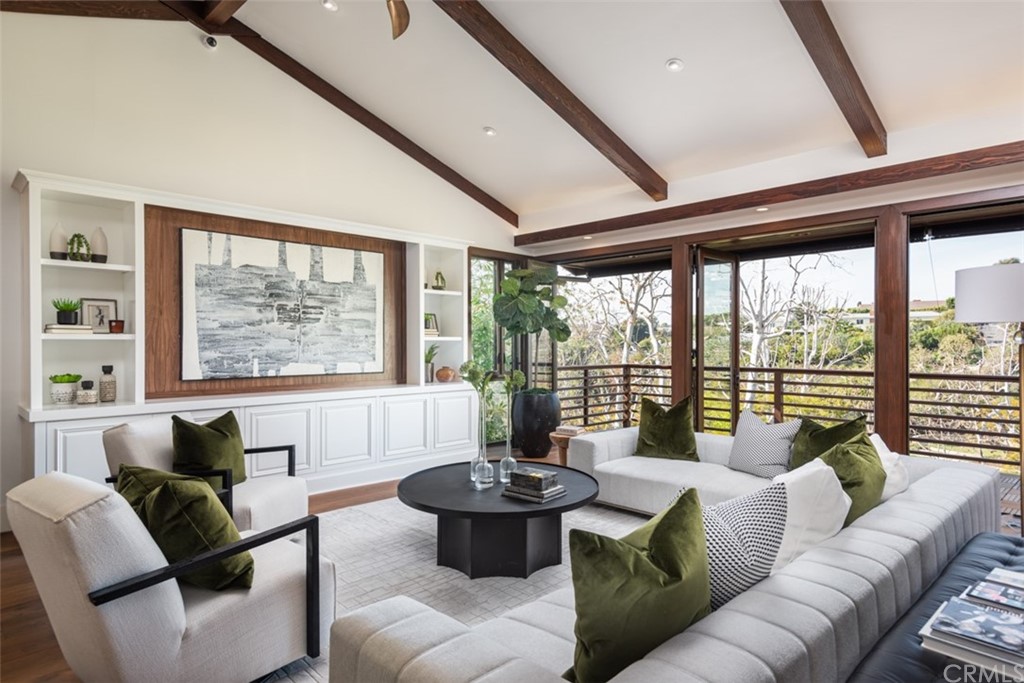 247 Emerald Bay Laguna Beach, CA 92651 - Photo 13 of 47 a living room with furniture and a large window