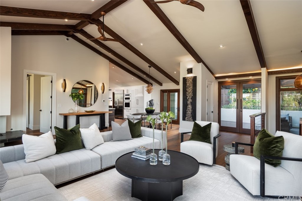 247 Emerald Bay Laguna Beach, CA 92651 - Photo 16 of 47 a living room with furniture and a large window