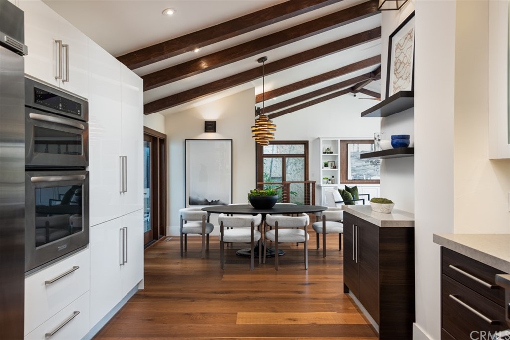 247 Emerald Bay Laguna Beach, CA 92651 - Photo 20 of 47 a kitchen with stainless steel appliances granite countertop a stove and cabinets