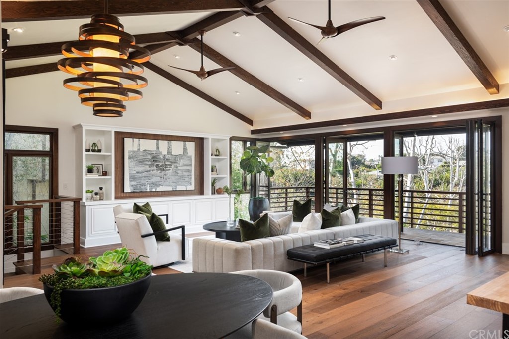 247 Emerald Bay Laguna Beach, CA 92651 - Photo 21 of 47 a living room with furniture and a large window
