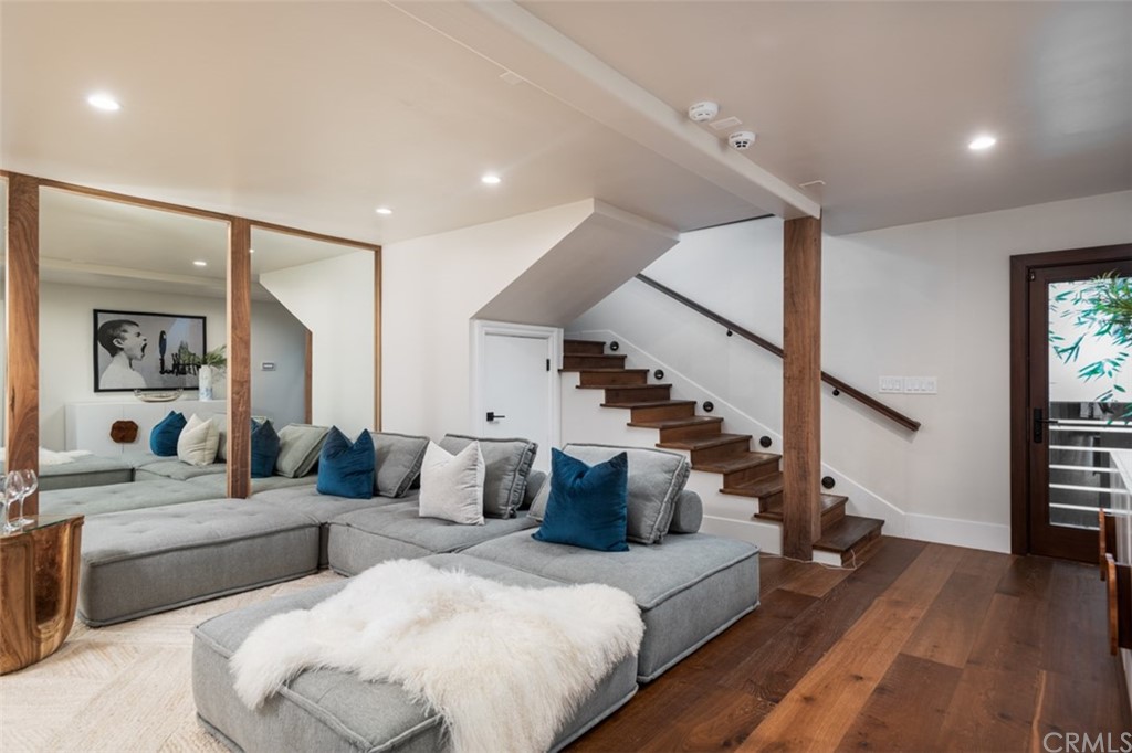 247 Emerald Bay Laguna Beach, CA 92651 - Photo 23 of 47 a living room with furniture and wooden floor