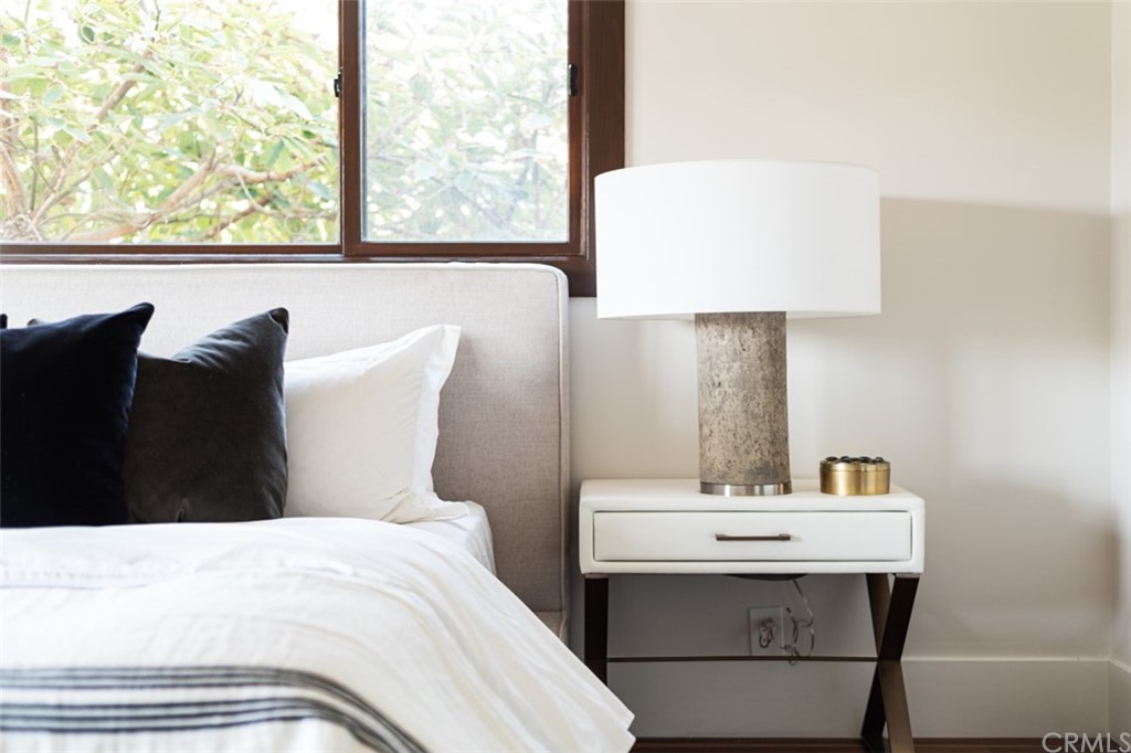 247 Emerald Bay Laguna Beach, CA 92651 - Photo 45 of 47 a bedroom with a bed and a window