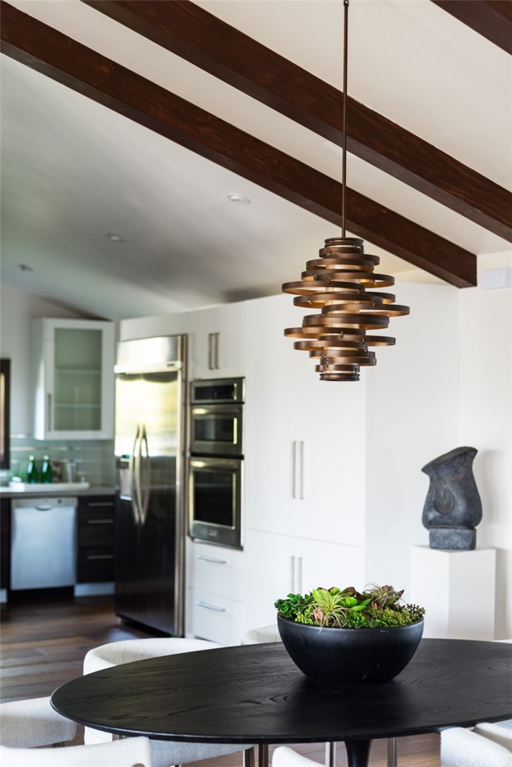 247 Emerald Bay Laguna Beach, CA 92651 - Photo 46 of 47 a kitchen with a refrigerator and a sink