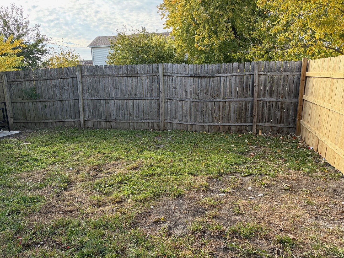 850 West 86th Place Chicago, IL 60620 - Photo 24 of 25 a view of a backyard with a small cabin and wooden fence