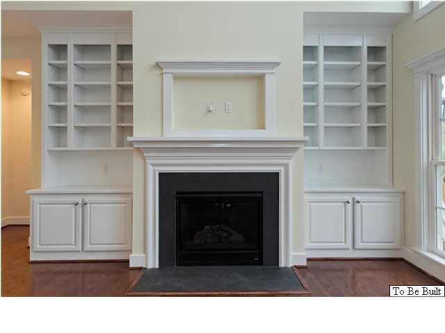 2630 South Bennington Road Charlottesville, VA 22901 - Photo 8 of 18 a living room with a fireplace and a walk in closet