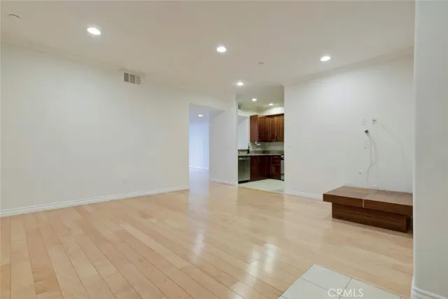 a view of kitchen with microwave and furniture