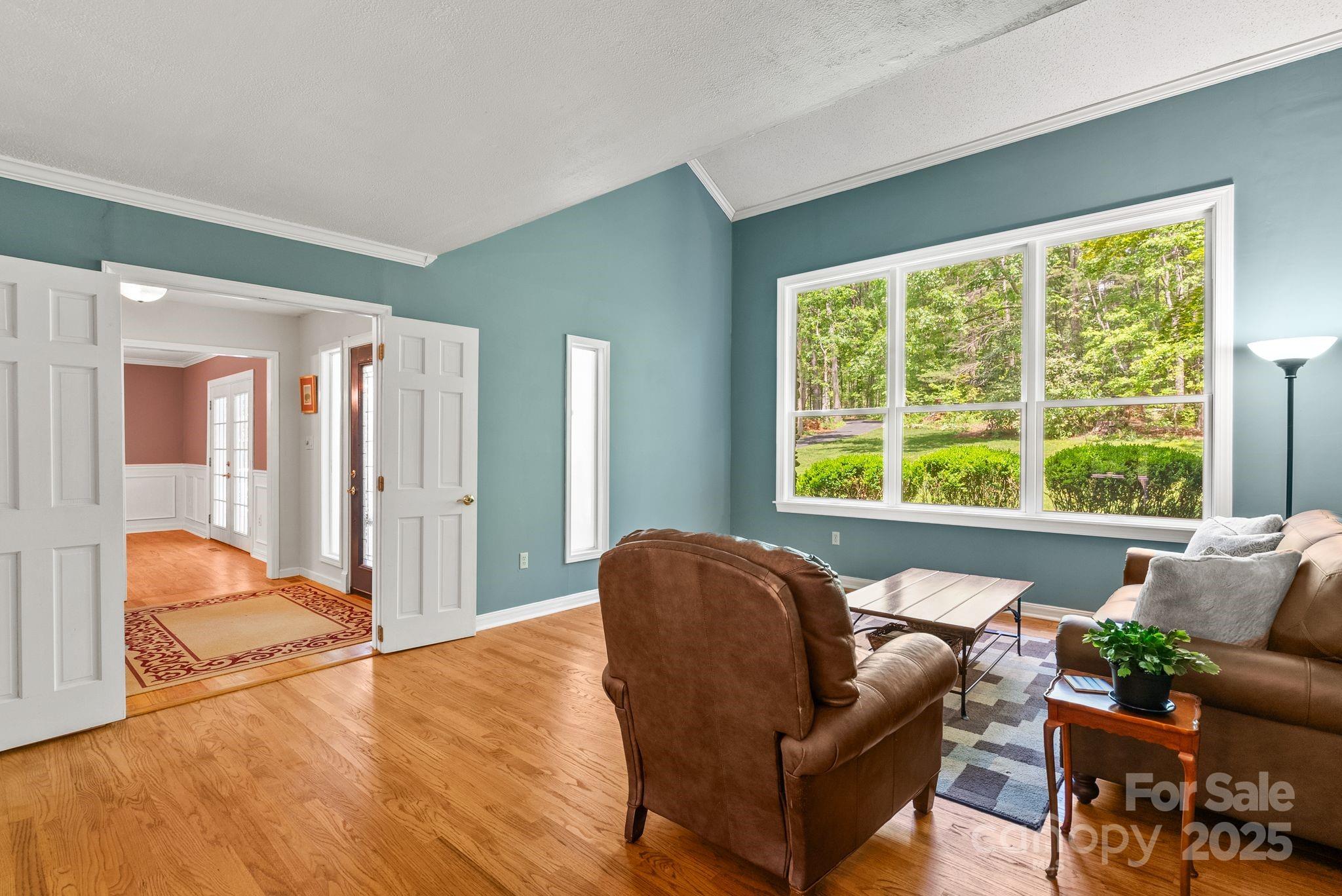 41 Glen Cove Road Arden, NC 28704 - Photo 15 of 39 a living room with furniture and a large window