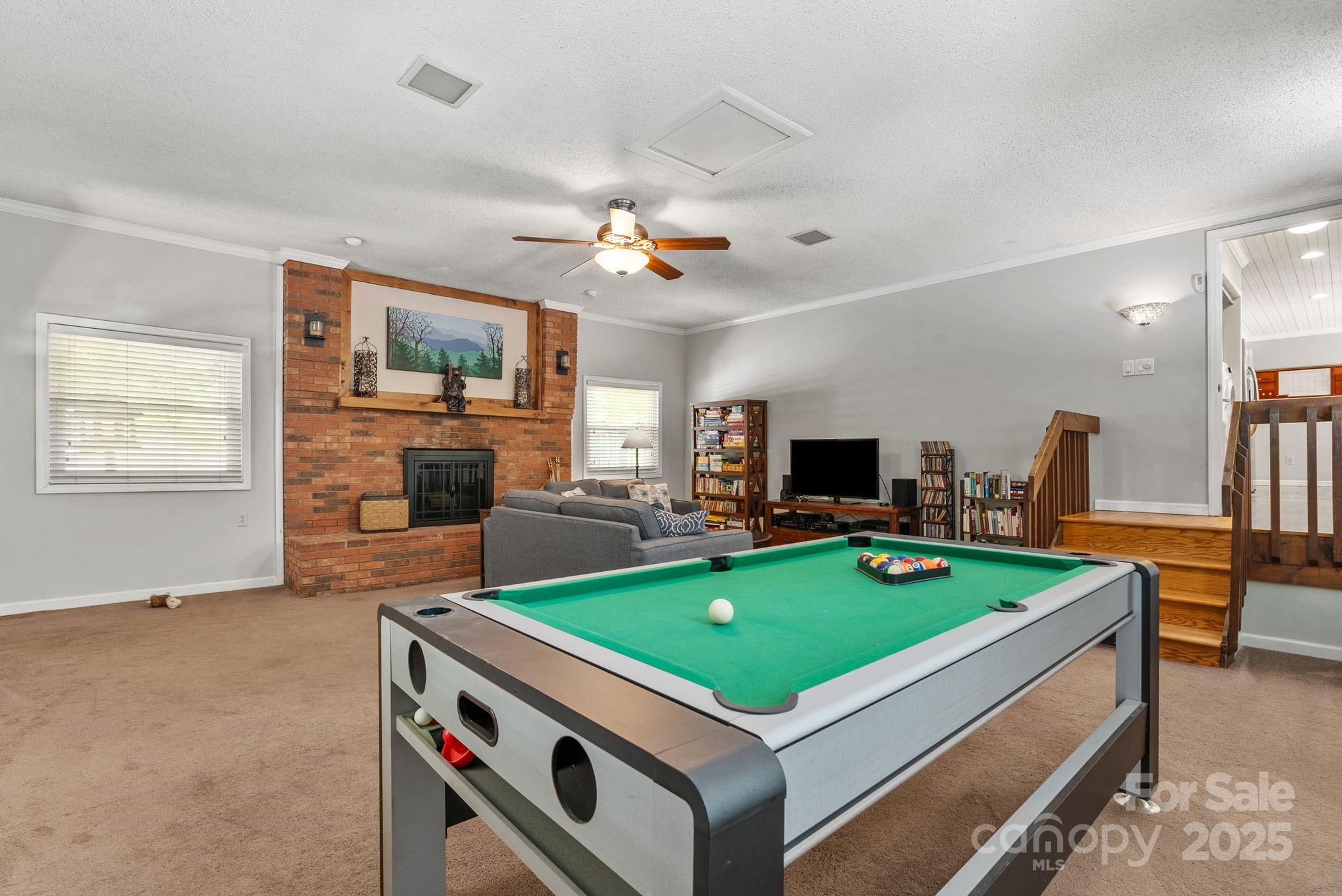 41 Glen Cove Road Arden, NC 28704 - Photo 19 of 39 a room with pool table flat screen tv and couches