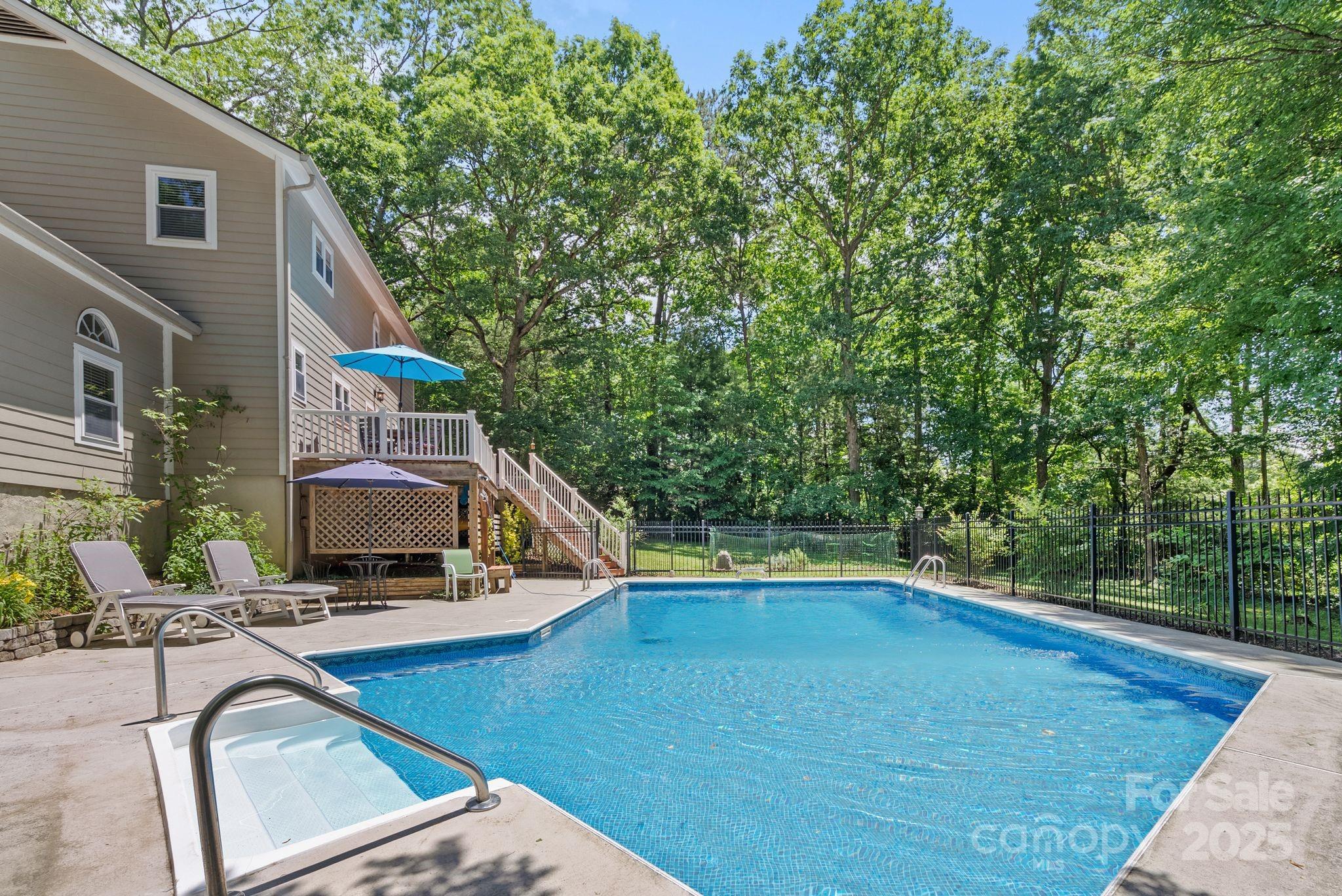 41 Glen Cove Road Arden, NC 28704 - Photo 23 of 39 a view of a house with pool and sitting area