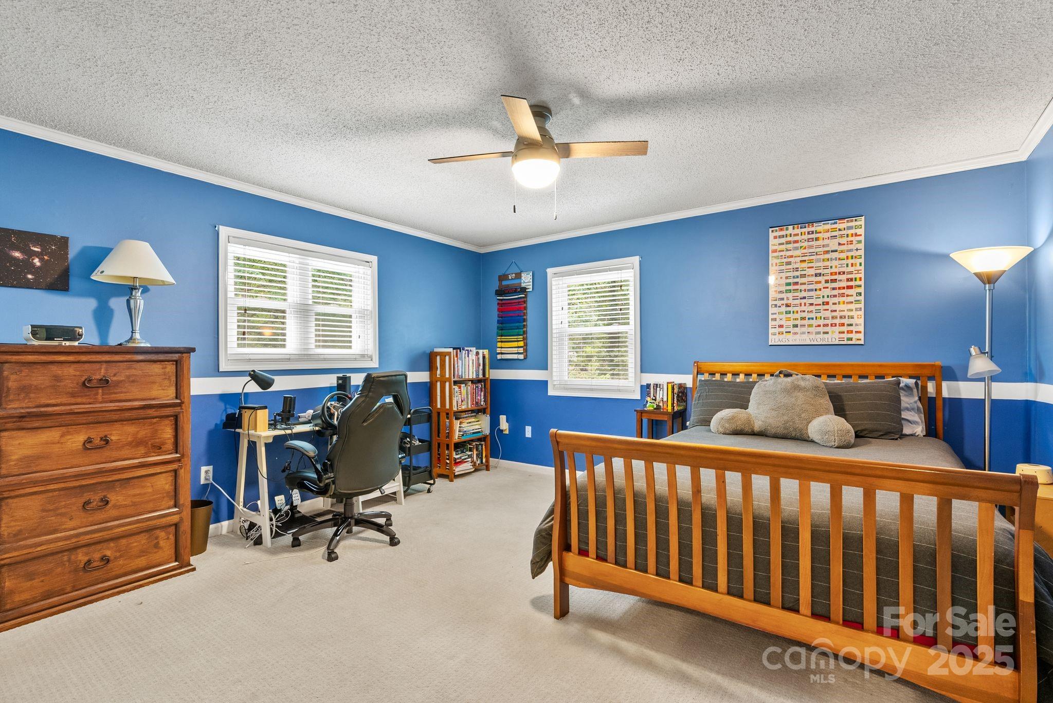 41 Glen Cove Road Arden, NC 28704 - Photo 31 of 39 a bedroom with furniture a bed and a window