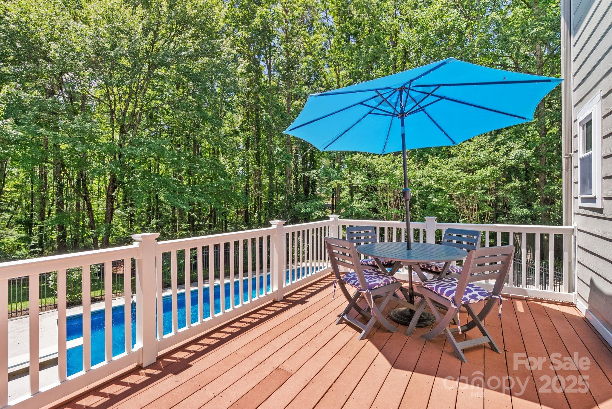 41 Glen Cove Road Arden, NC 28704 - Photo 33 of 39 a view of balcony with outdoor seating and wooden floor