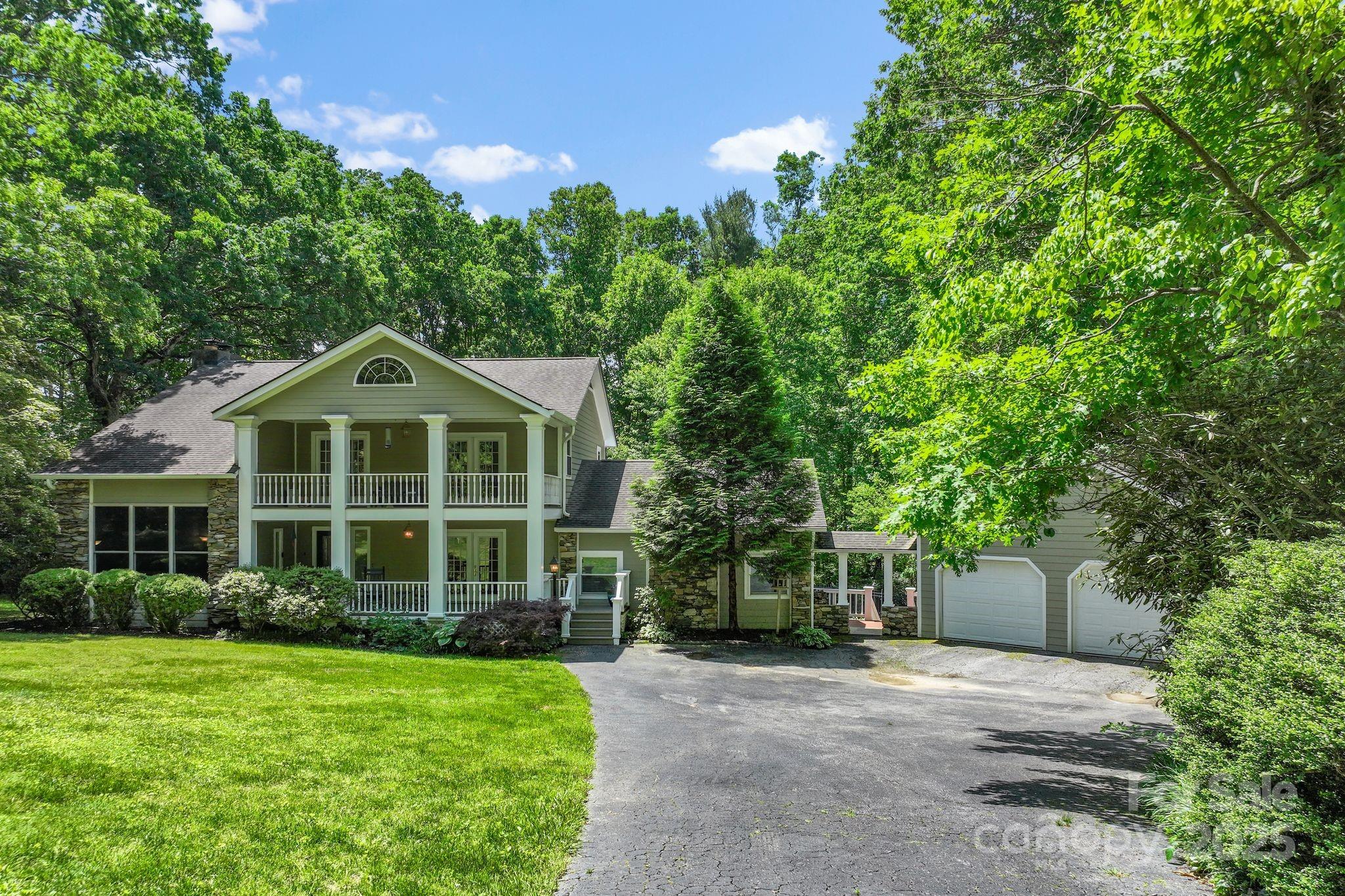 41 Glen Cove Road Arden, NC 28704 - Photo 36 of 39 a front view of a house with a yard