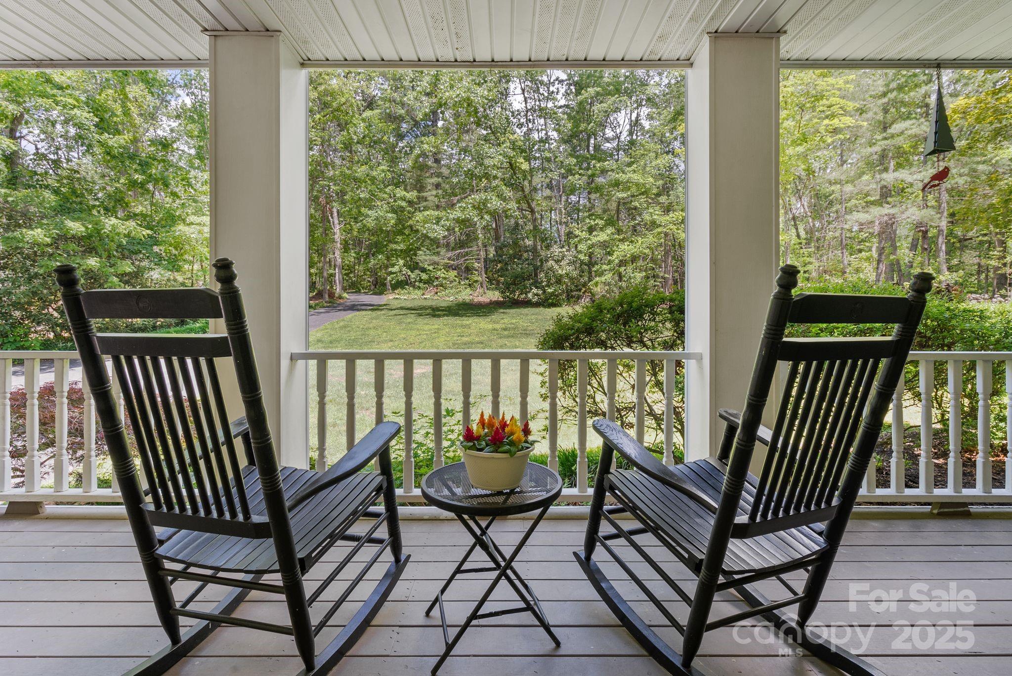41 Glen Cove Road Arden, NC 28704 - Photo 6 of 39 a view of a two chairs in the balcony