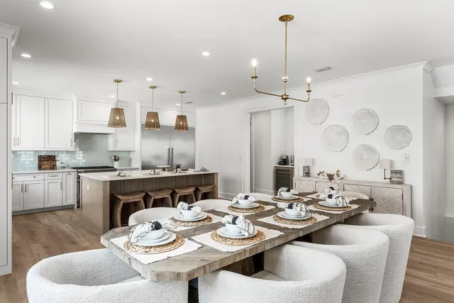 a kitchen with a sink cabinets and a stove
