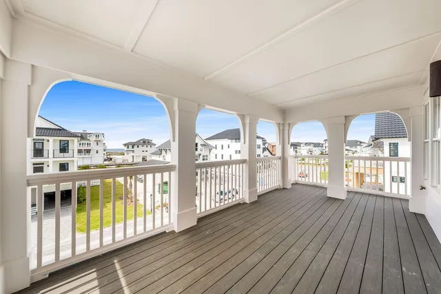 a spacious bathroom with a double vanity sink mirror and shower