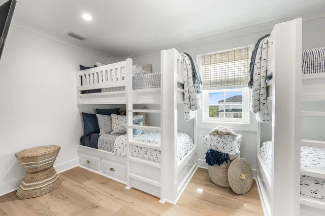 a bed room with a bed and a window