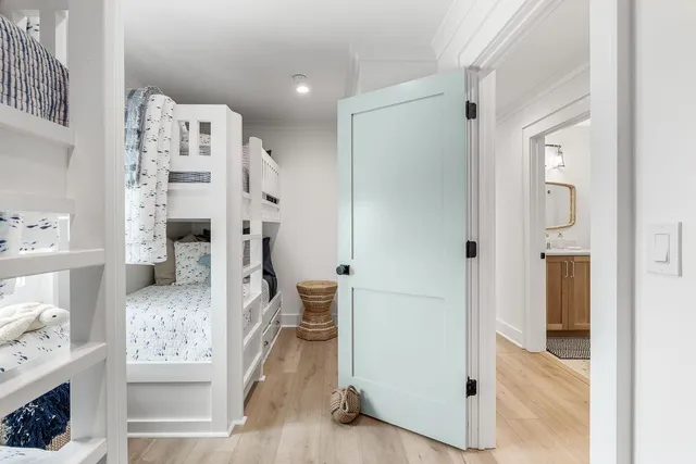 a bedroom with bed and tv