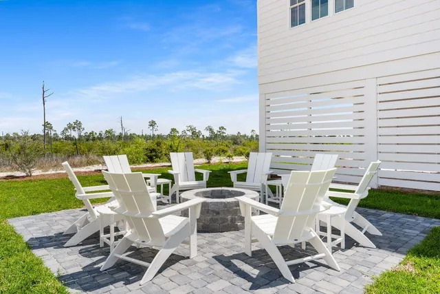 an aerial view of residential building with ocean view
