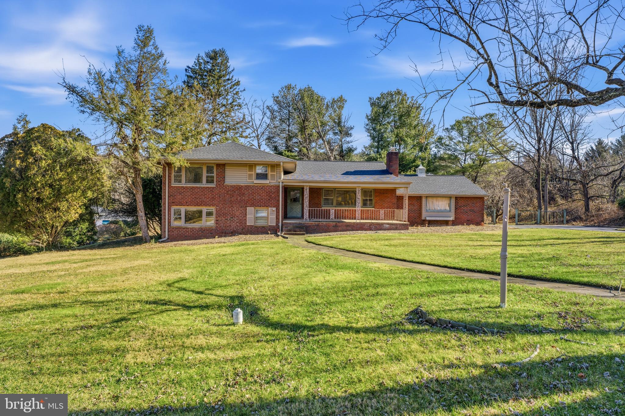 2026 Dumont Road Lutherville-Timonium, MD 21093 - Photo 1 of 41 a front view of house with yard and green space