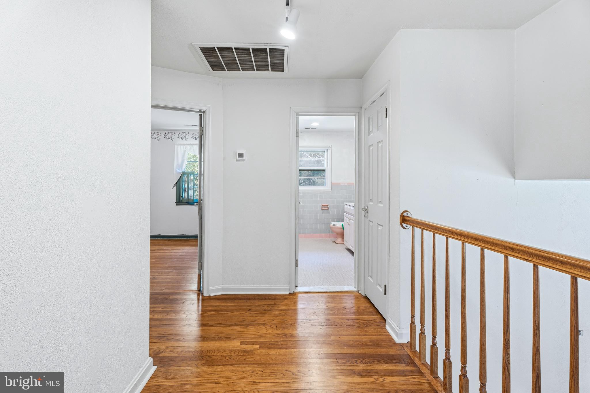 2026 Dumont Road Lutherville-Timonium, MD 21093 - Photo 20 of 41 a view of a hallway view with wooden floor and staircase