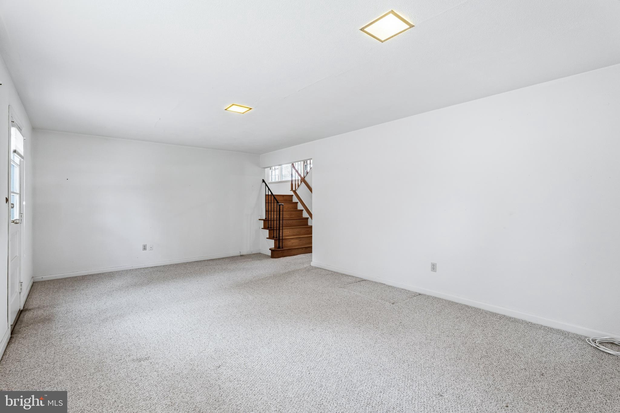 2026 Dumont Road Lutherville-Timonium, MD 21093 - Photo 24 of 41 an empty room with a window and a ceiling fan