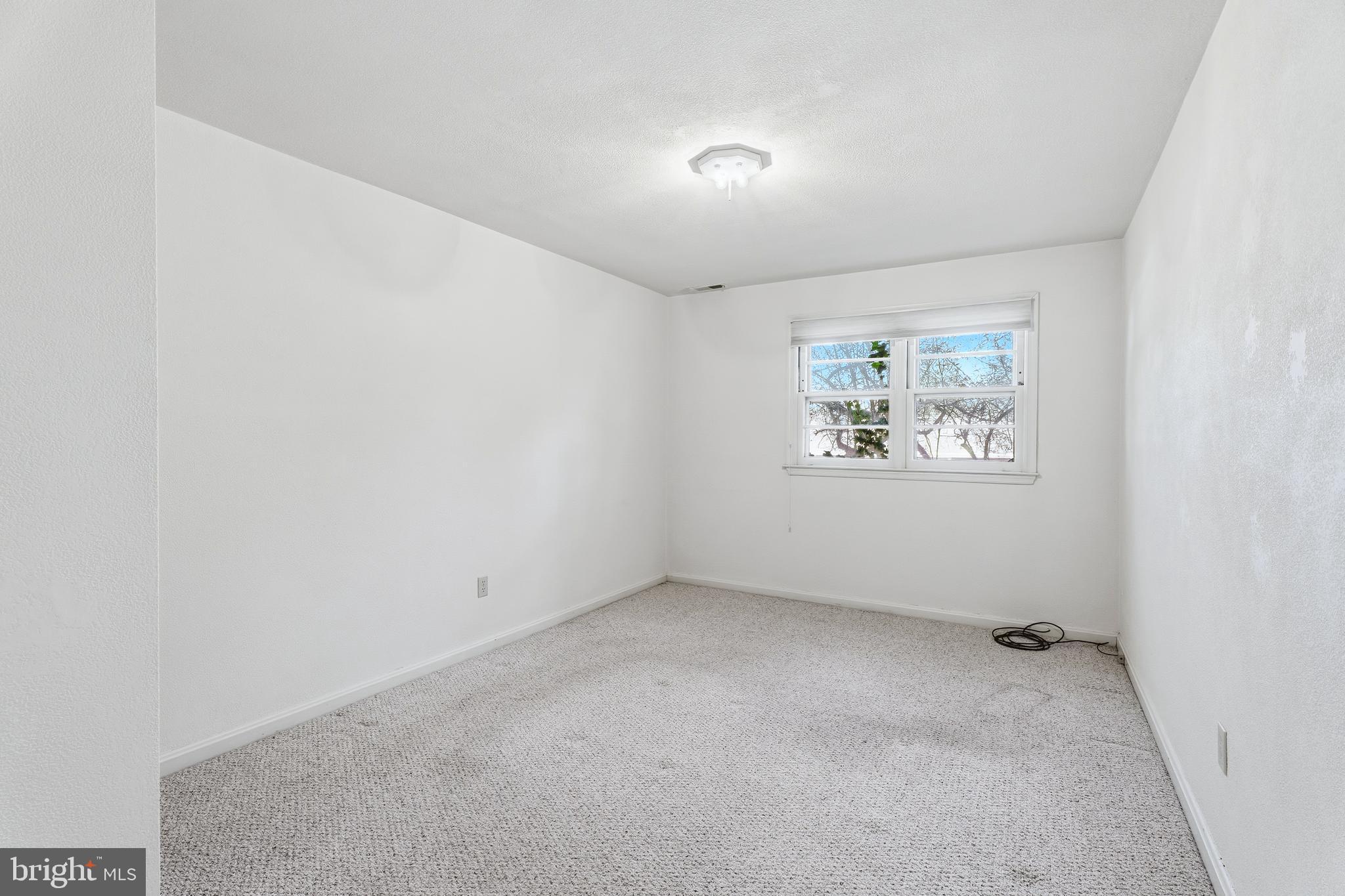 2026 Dumont Road Lutherville-Timonium, MD 21093 - Photo 26 of 41 an empty room with windows
