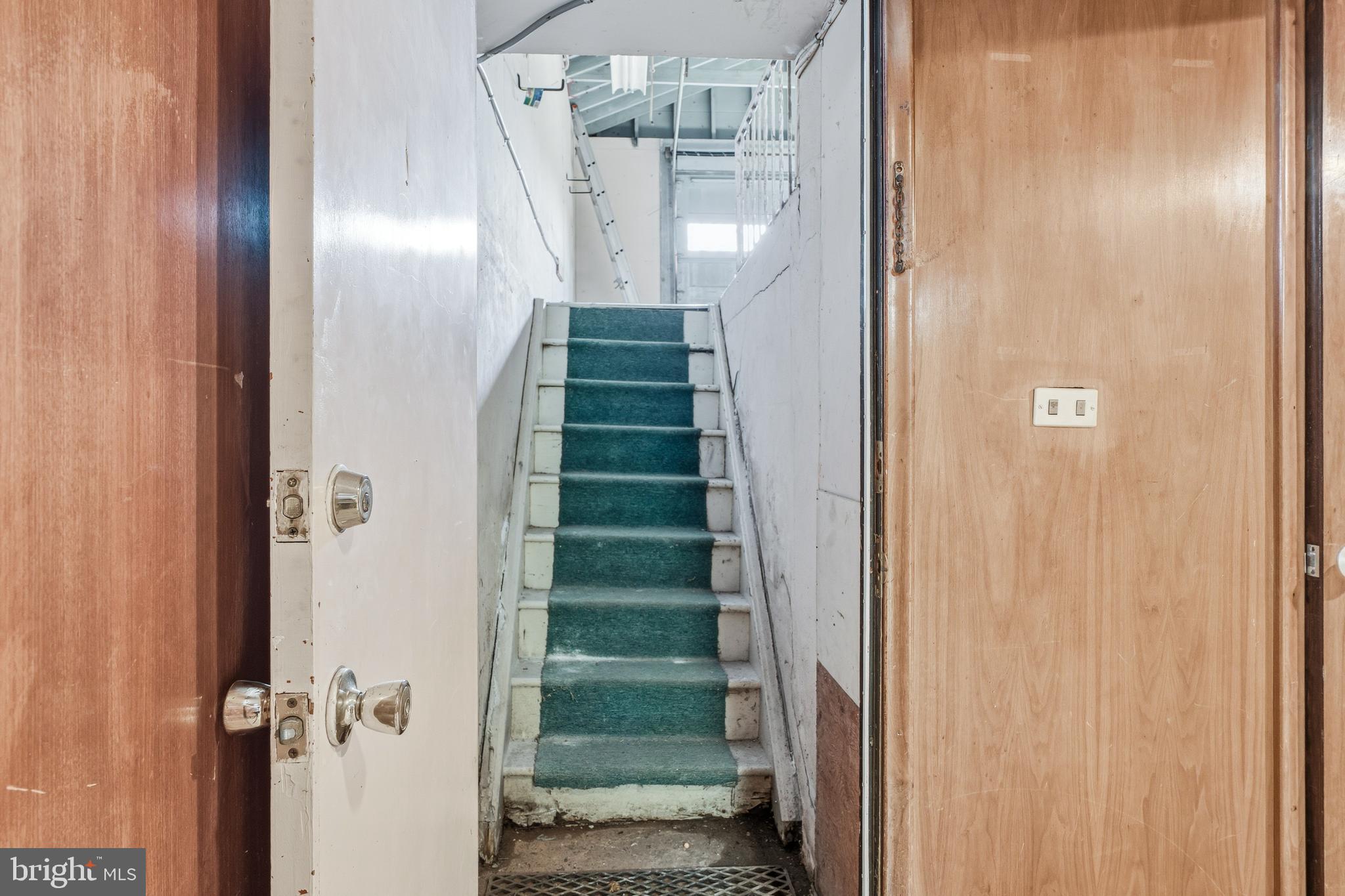 2026 Dumont Road Lutherville-Timonium, MD 21093 - Photo 34 of 41 a view of a hallway with windows and stairs