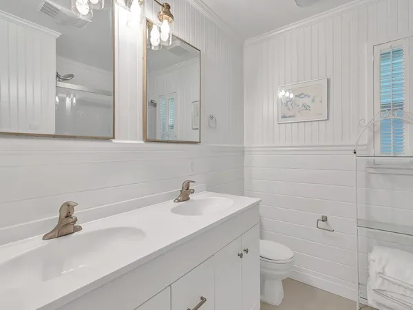 a bathroom with a sink and a toilet