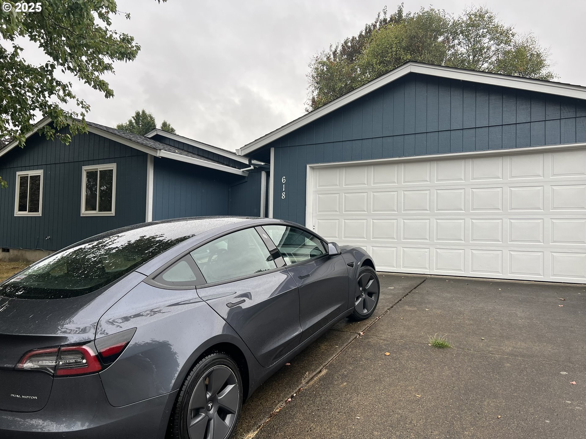 618 Ballad Way Forest Grove, OR 97116 - Photo 15 of 15 a car parked in front of a house