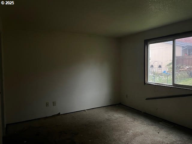 618 Ballad Way Forest Grove, OR 97116 - Photo 8 of 15 a view of an empty room with a window