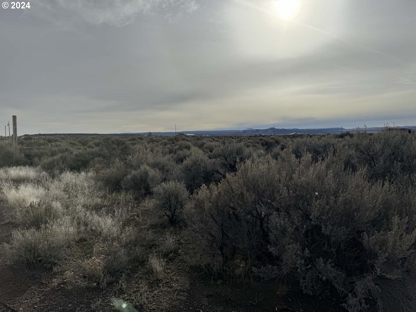 Twighlight Road, Unit TL 4000 Christmas Valley, OR 97641 - Photo 19 of 40 a view of a field of grass and trees