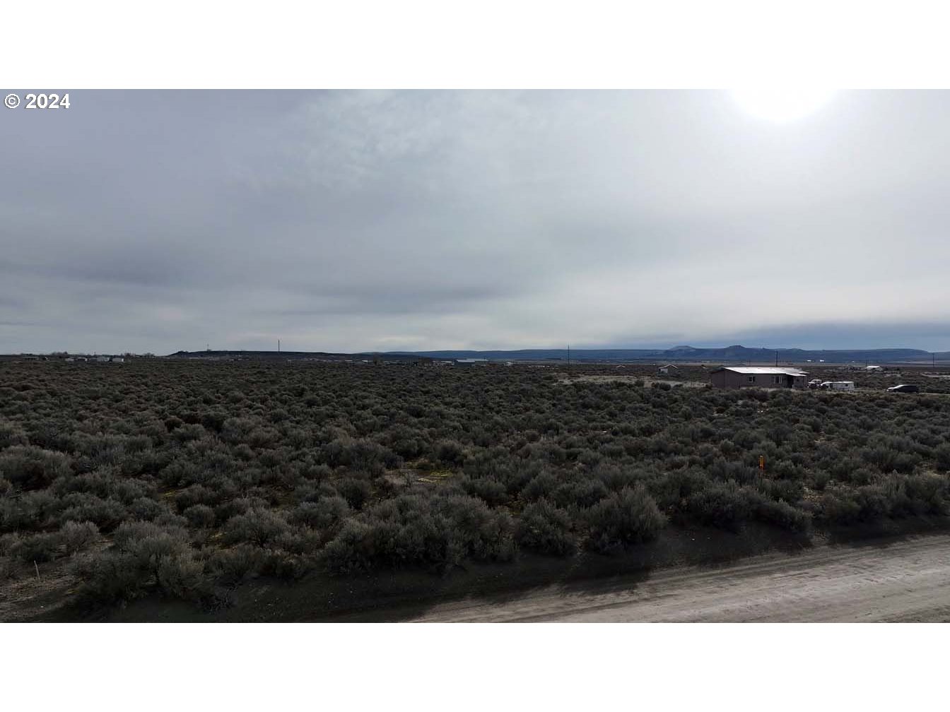 Twighlight Road, Unit TL 4000 Christmas Valley, OR 97641 - Photo 2 of 40 a black and white photo of a city