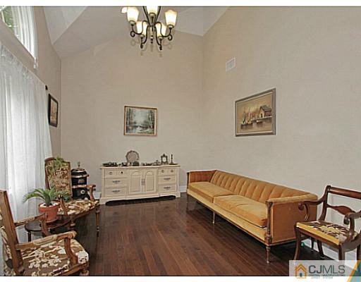 1881 Raritan Road Scotch Plains, NJ 07076 - Photo 14 of 18 a living room with furniture and a wooden floor
